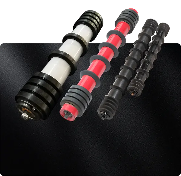Conveyor belt cleaner and rubber disc roller